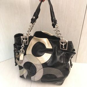 Coach black and gold shoulder bag.